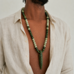 Handmade green ceramic spear pendant with artisan bead necklace