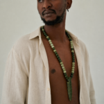 Men wearing green ceramic spear pendant necklace handmade jewelry